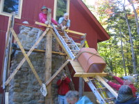 A flue liner goes up the ladder